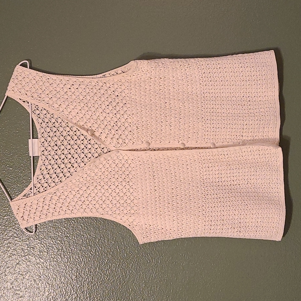white villager vest sweater